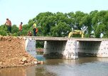 Работы по строительству моста в поселке Тимирязевском продолжаются